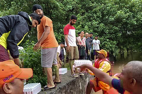 NDRF personnel during a relief operation in Navsari